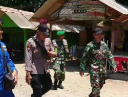 Aipda Adi Supdrajad Lakukan Pengamanan Natal Dan Tahun Baru Di Pantai Pulau Merah